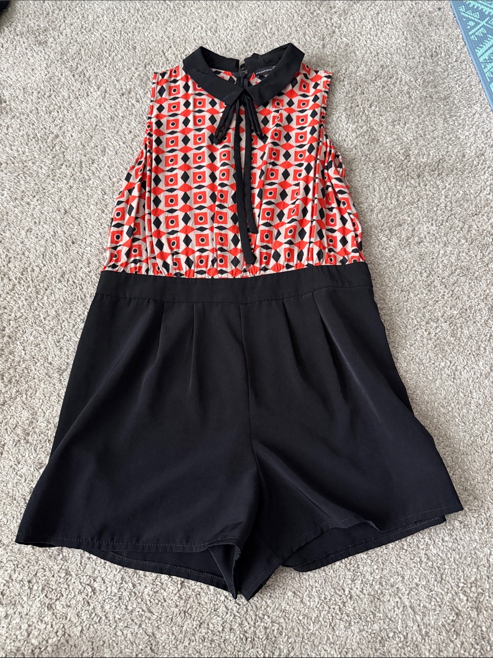 Sleeveless Bow Tie Romper with Geometric Orange Print
